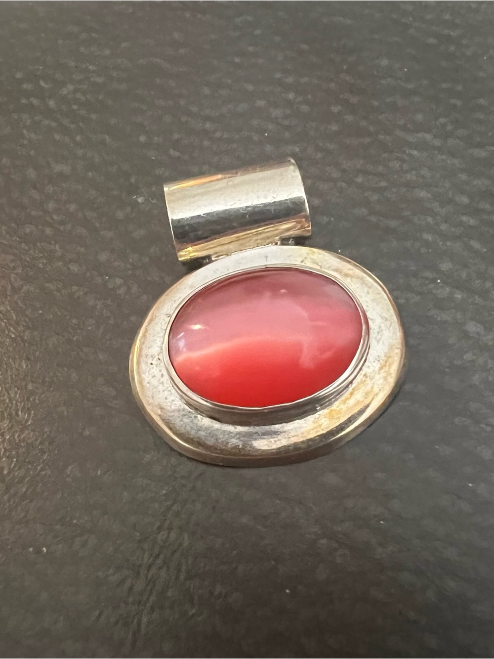 Sterling Silver Pendant with pink Oval Stone it does glow